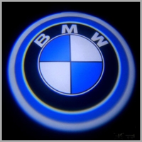 Штатные проекторы в двери BMW 7W